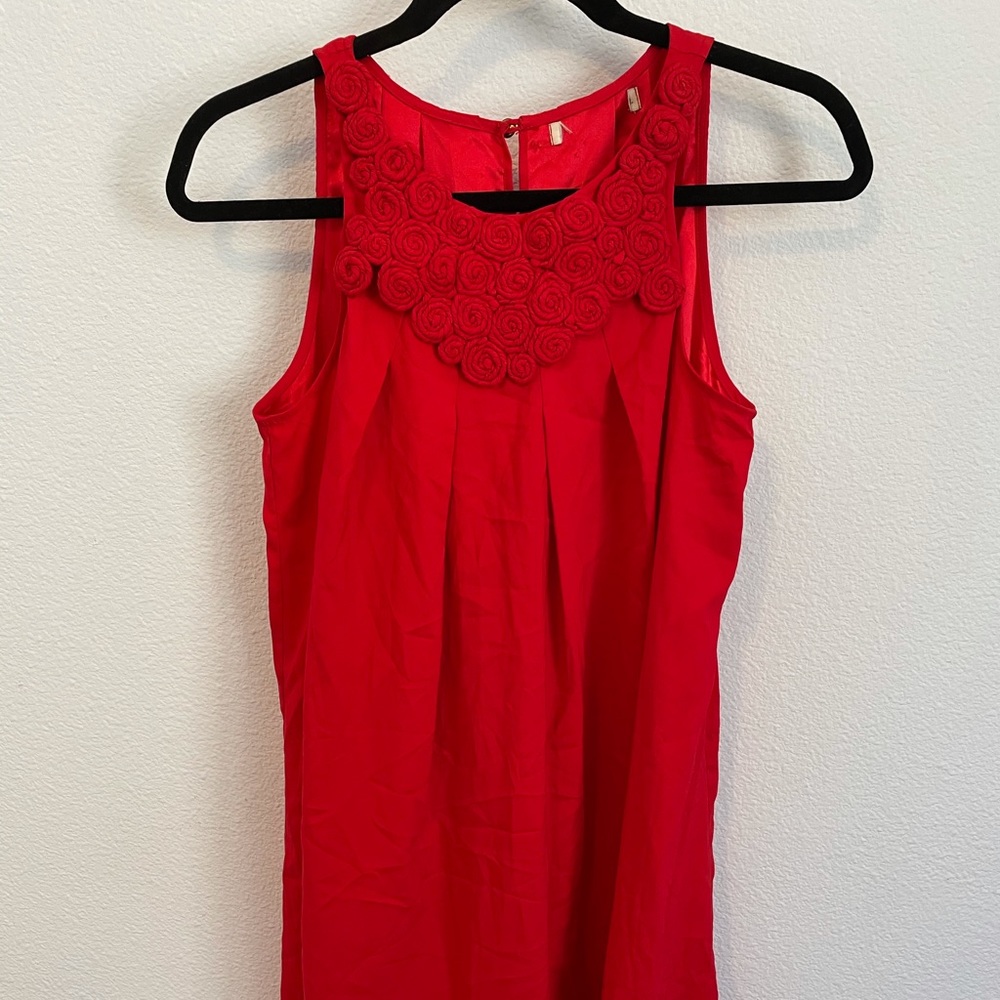 Flowy satin dress with rose neck detail